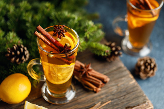 Spicy grog cocktail. Christmas or New Year hot winter drink. Au