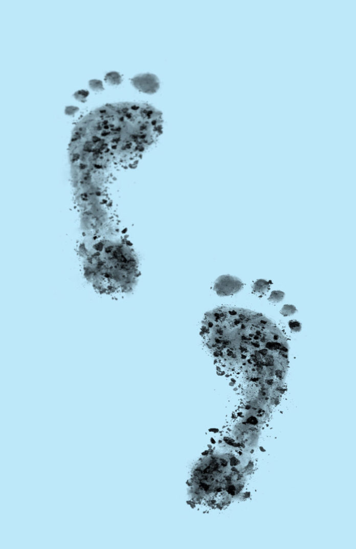 Carbon,Footprints,Concept,For,Carbon,Emissions,And,Climate,Change